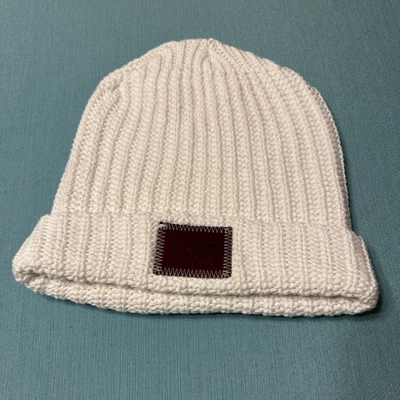 White Love Your Melon cuffed beanie with brown patch. - Picture 1 of 6